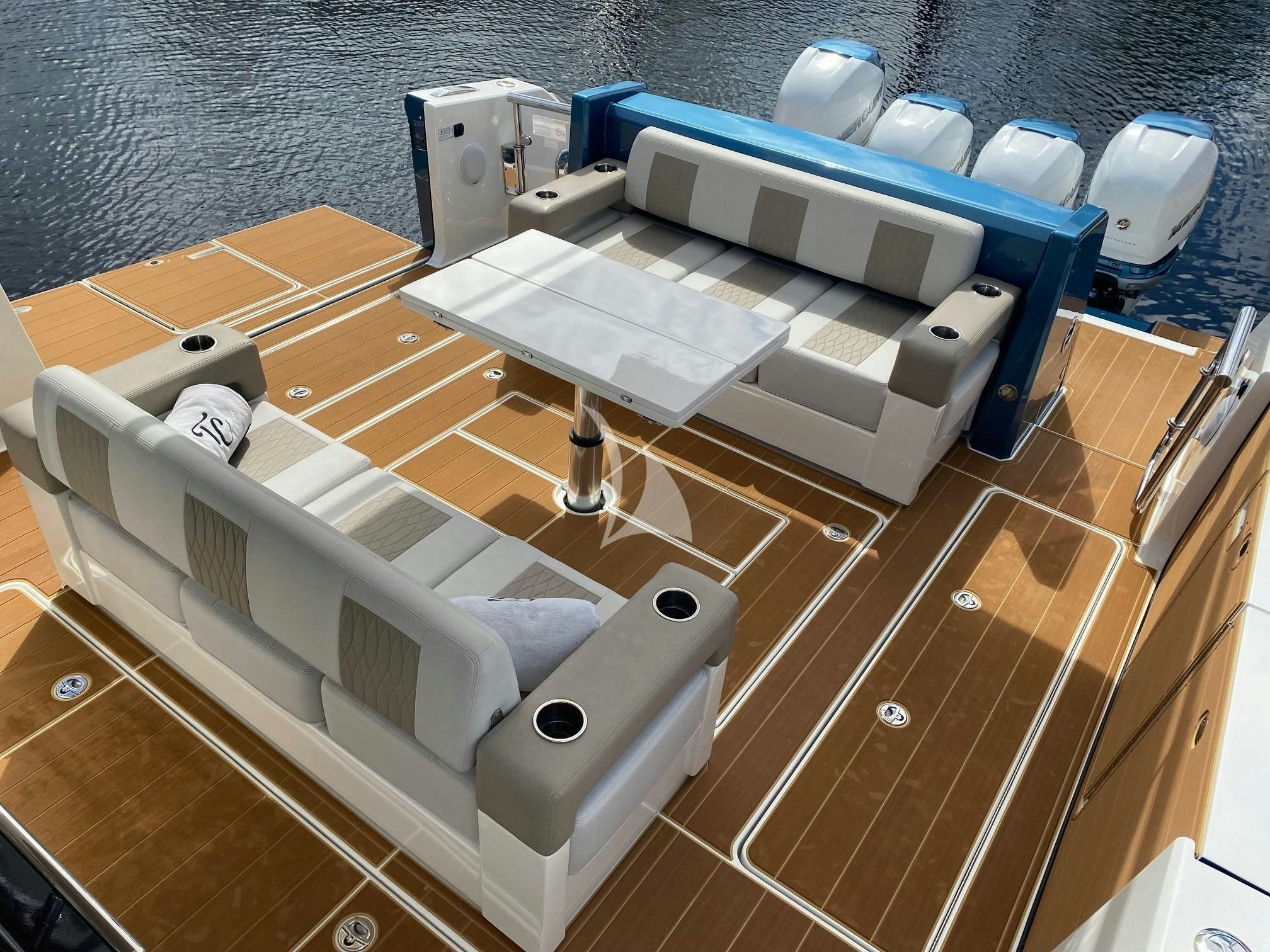 a boat on a deck aboard CAPTAIN MORGAN III Yacht for Sale