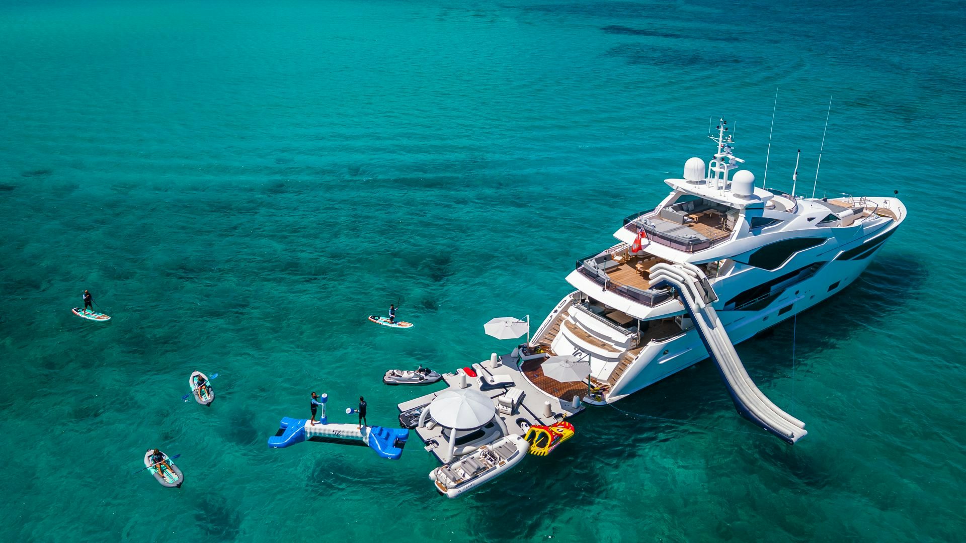 a group of boats in the water aboard CAPTAIN MORGAN III Yacht for Sale