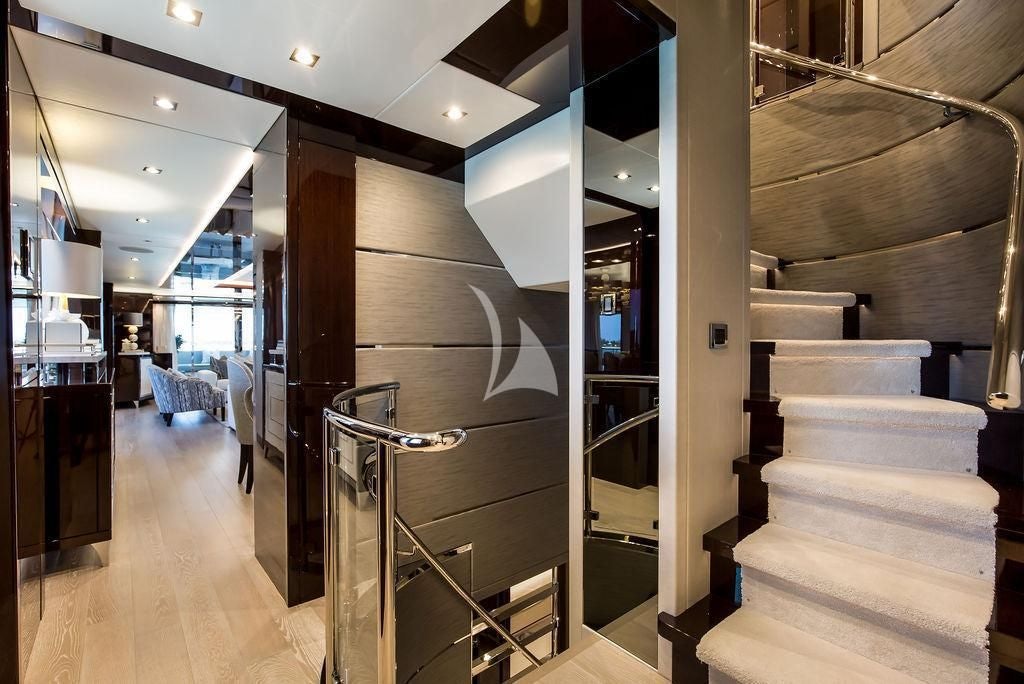 a staircase in a building aboard CAPTAIN MORGAN III Yacht for Sale
