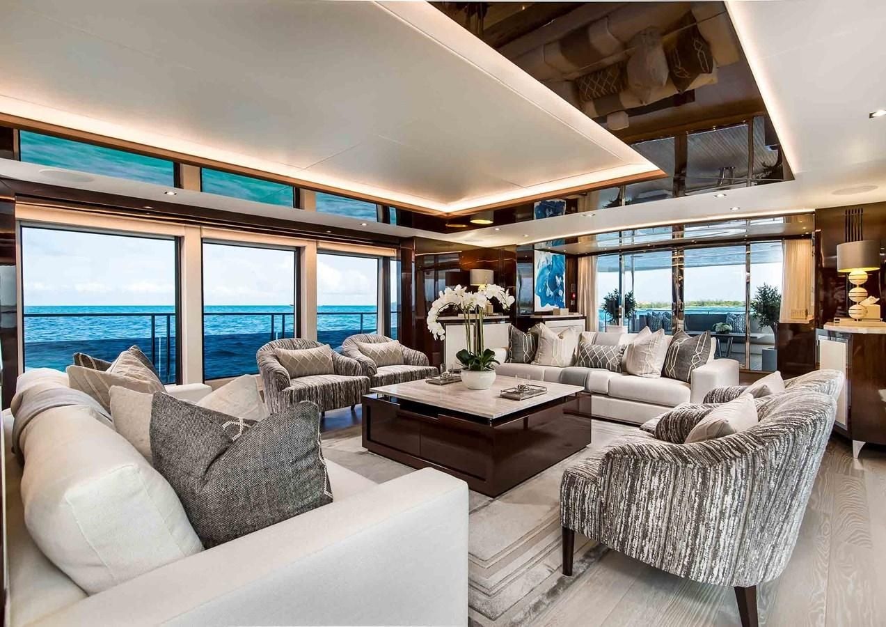 a living room with a large window aboard CAPTAIN MORGAN III Yacht for Sale