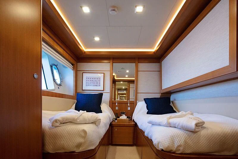 a room with two beds aboard BEST OFF Yacht for Charter
