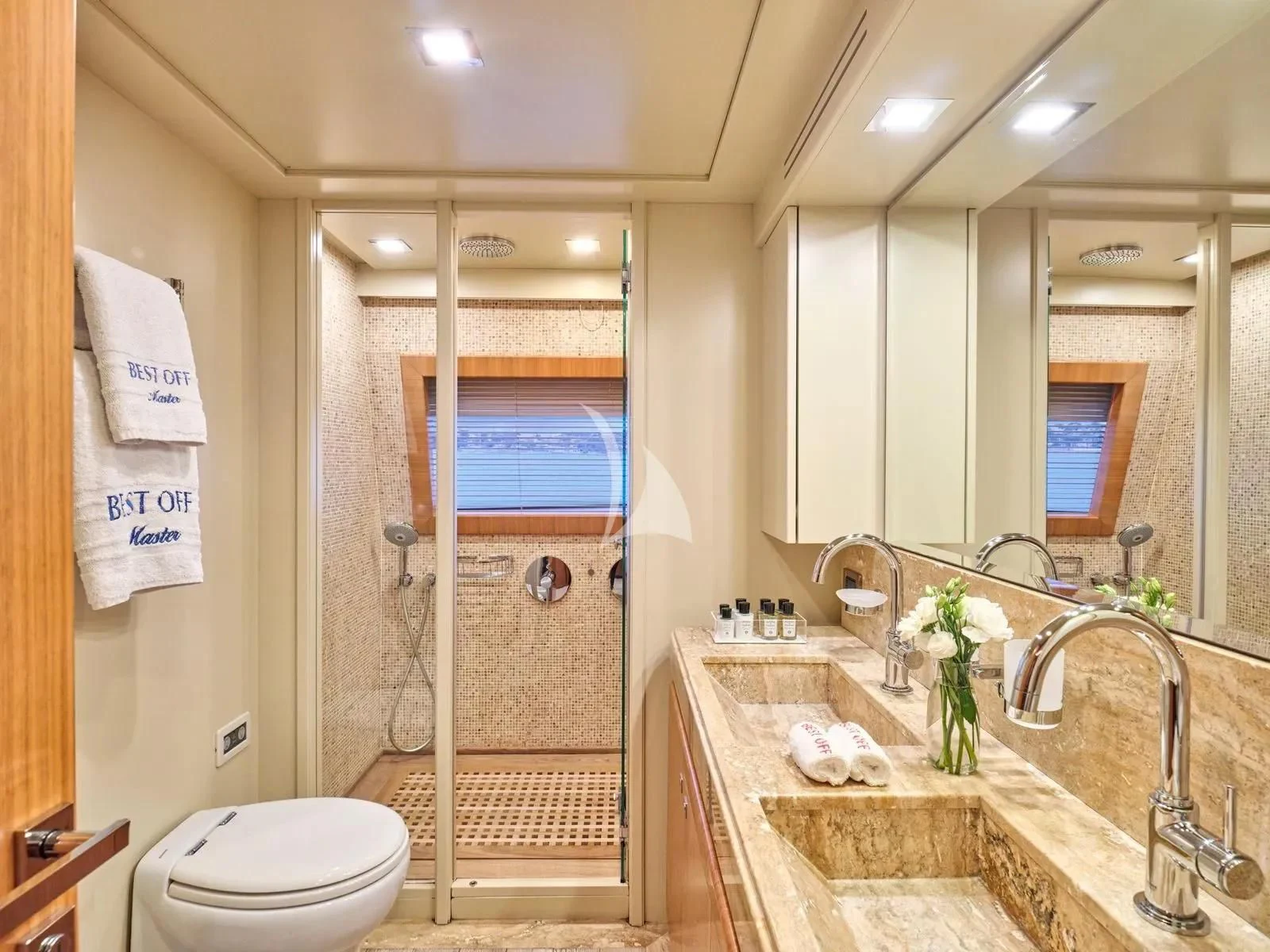 a bathroom with a marble counter top aboard BEST OFF Yacht for Charter