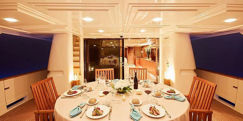 a table set for a dinner aboard BEST OFF Yacht for Charter