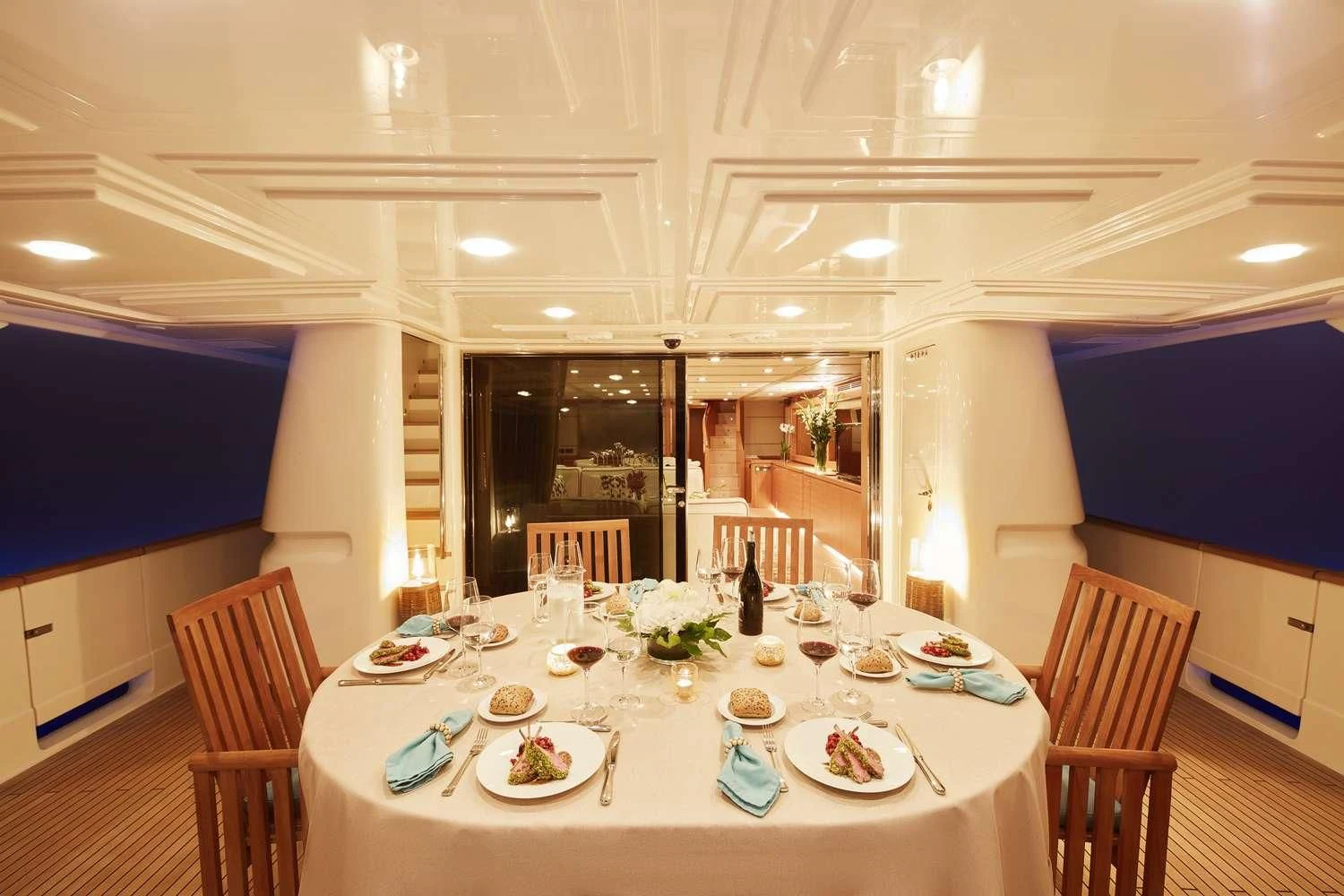 a dining room with a table set aboard BEST OFF Yacht for Charter
