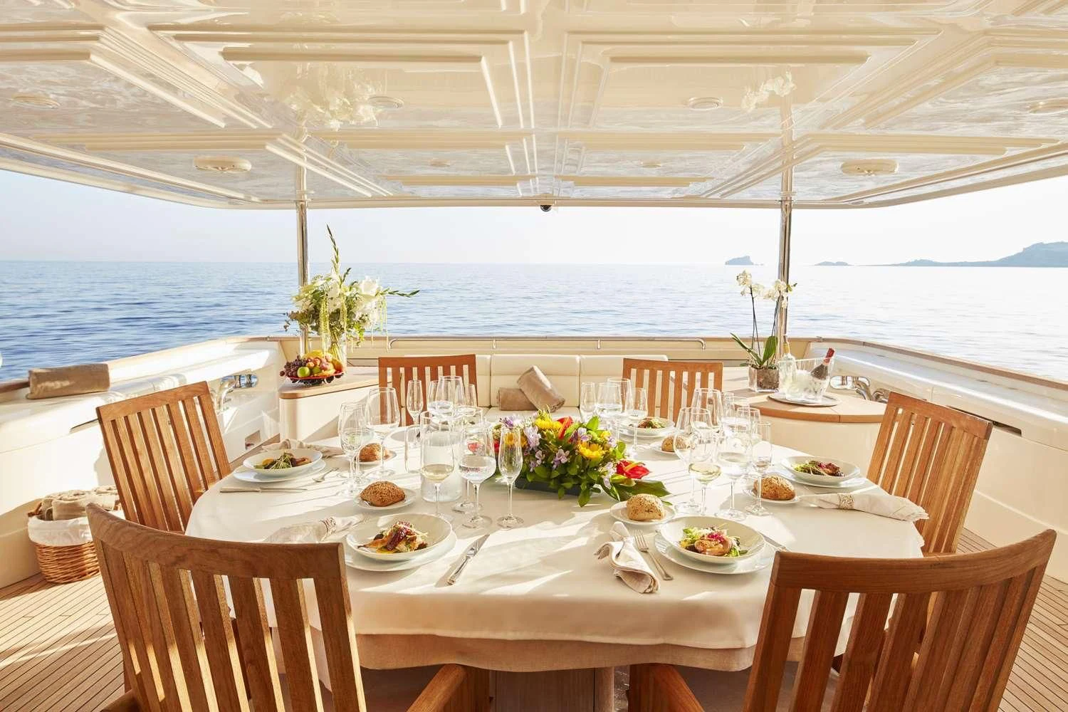 a table set for a meal on a boat aboard BEST OFF Yacht for Charter