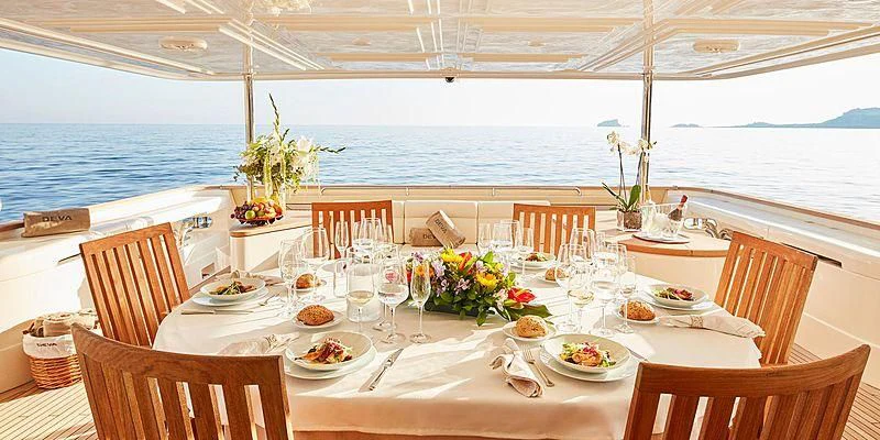 a table set for a meal aboard BEST OFF Yacht for Charter