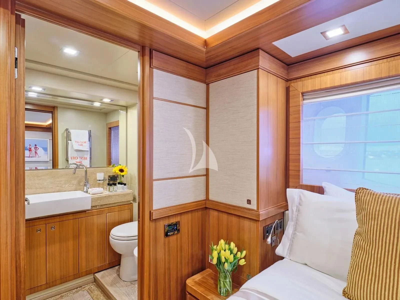 a bathroom with a mirror and a sink aboard BEST OFF Yacht for Charter