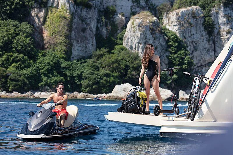 a man and woman on a boat aboard BEST OFF Yacht for Charter