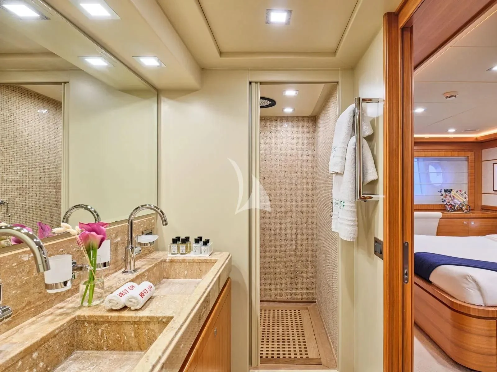 a bathroom with a sink and a shower aboard BEST OFF Yacht for Charter