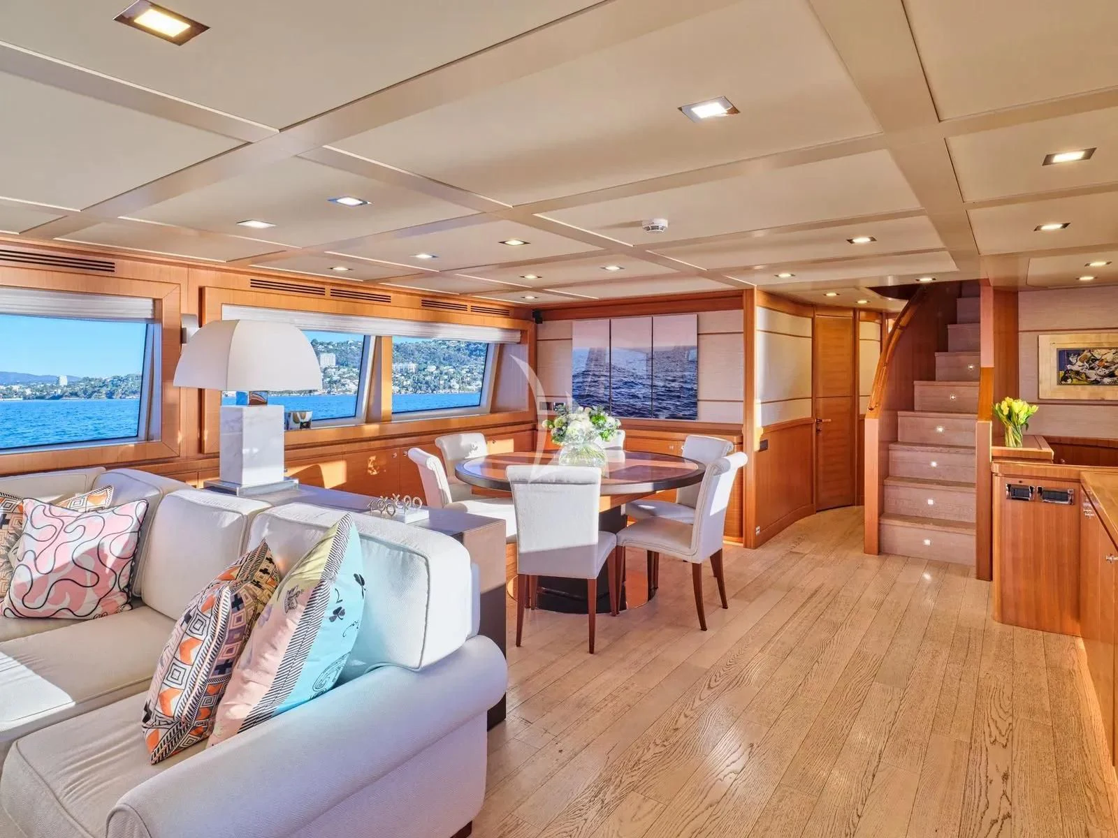 a living room with a wood floor aboard BEST OFF Yacht for Charter