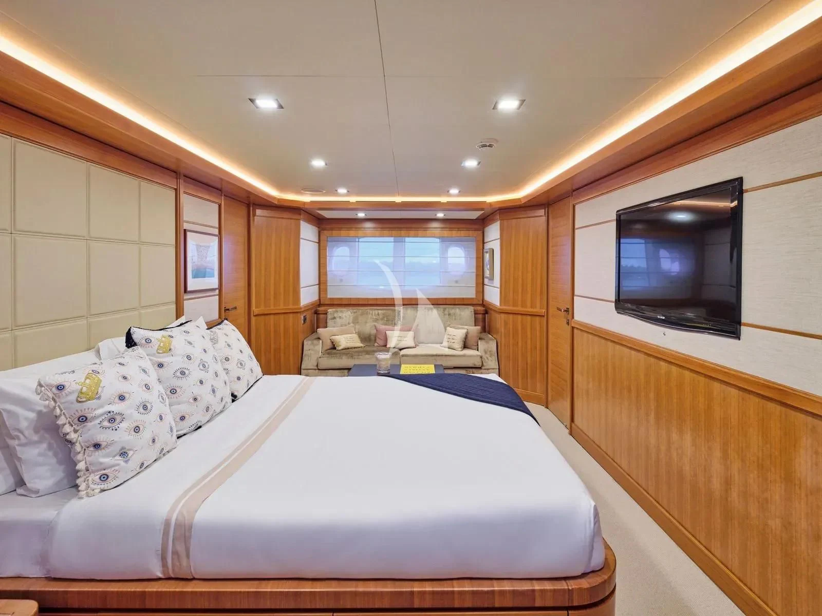a bedroom with a large bed aboard BEST OFF Yacht for Charter