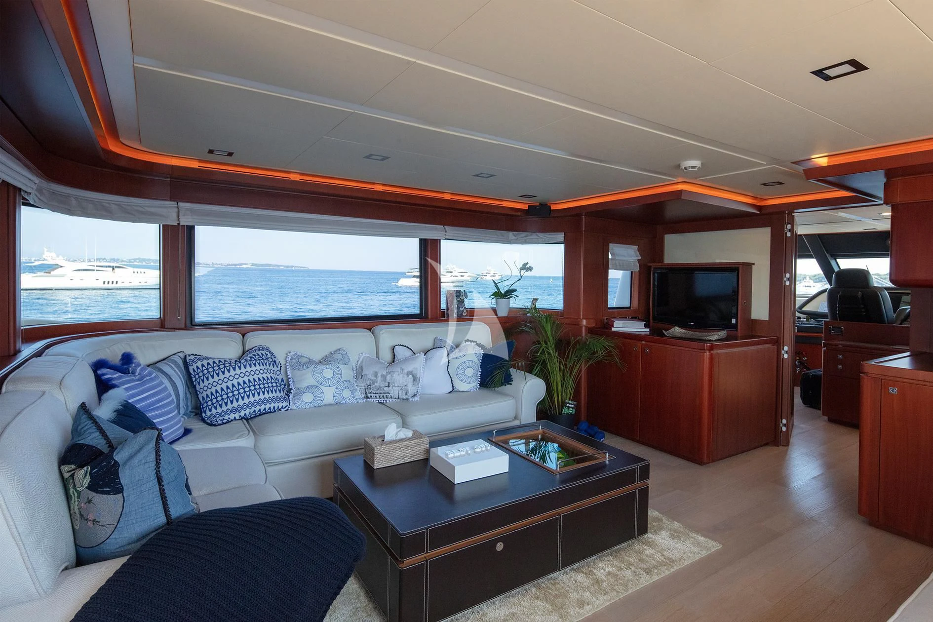 a living room with a large window aboard BEST OFF Yacht for Charter