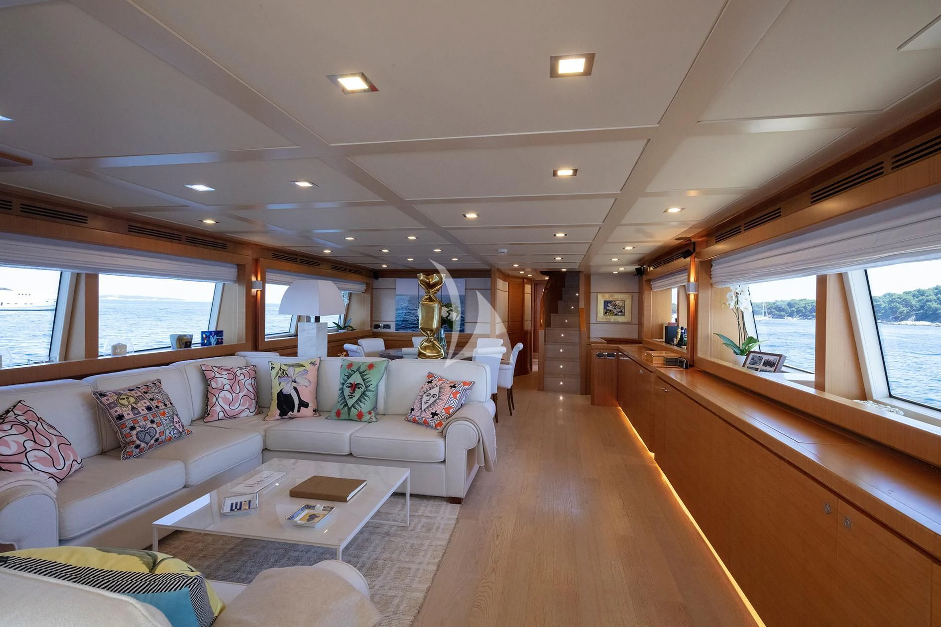 a living room with a large window aboard BEST OFF Yacht for Charter