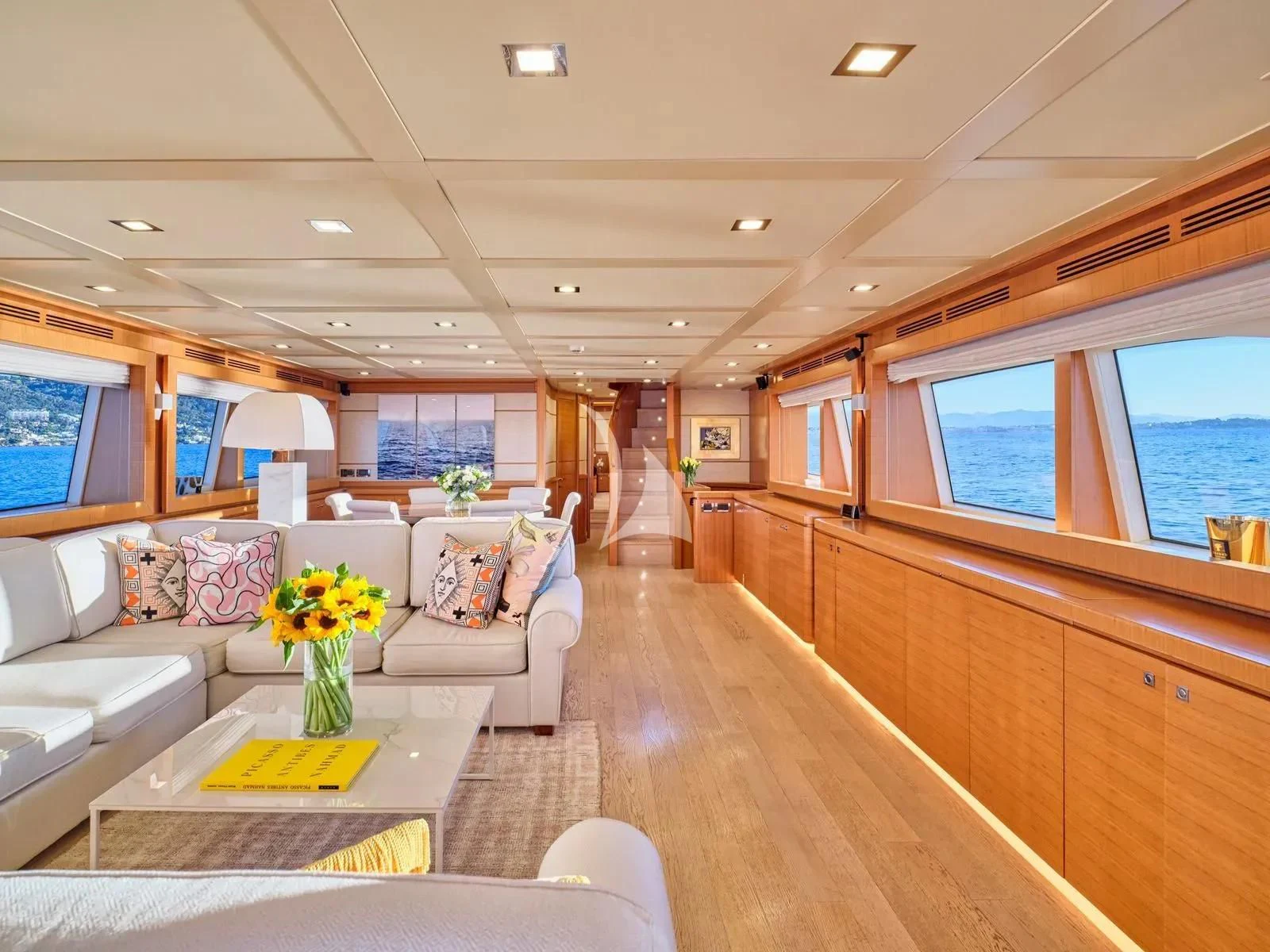 a living room with a wood floor aboard BEST OFF Yacht for Charter