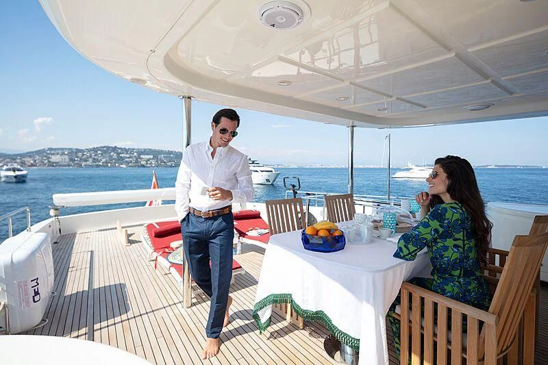a man and woman on a boat aboard BEST OFF Yacht for Charter