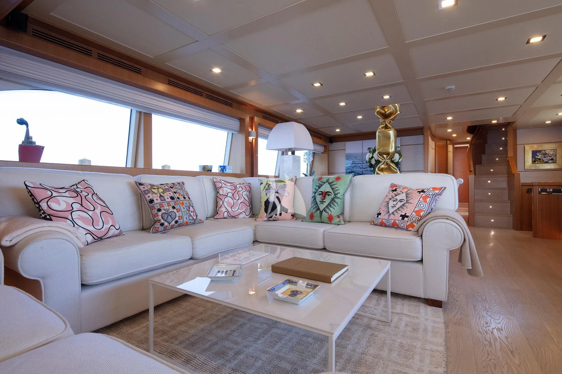 a living room with a large window aboard BEST OFF Yacht for Charter