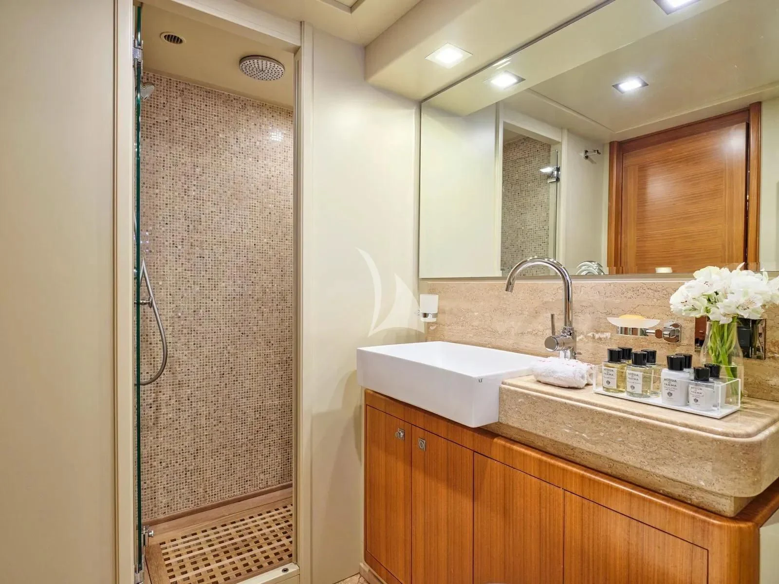 a bathroom with a sink and a mirror aboard BEST OFF Yacht for Charter