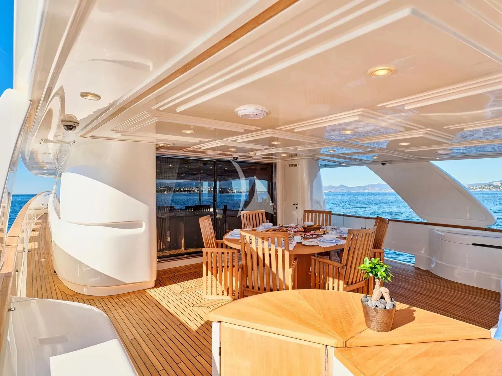 a room with a table and chairs aboard BEST OFF Yacht for Charter
