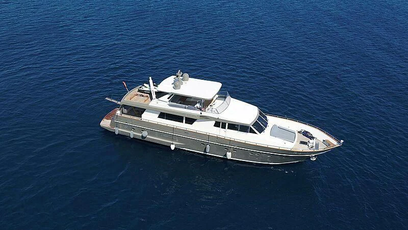 a white boat in the water aboard BONA DEA Yacht for Sale