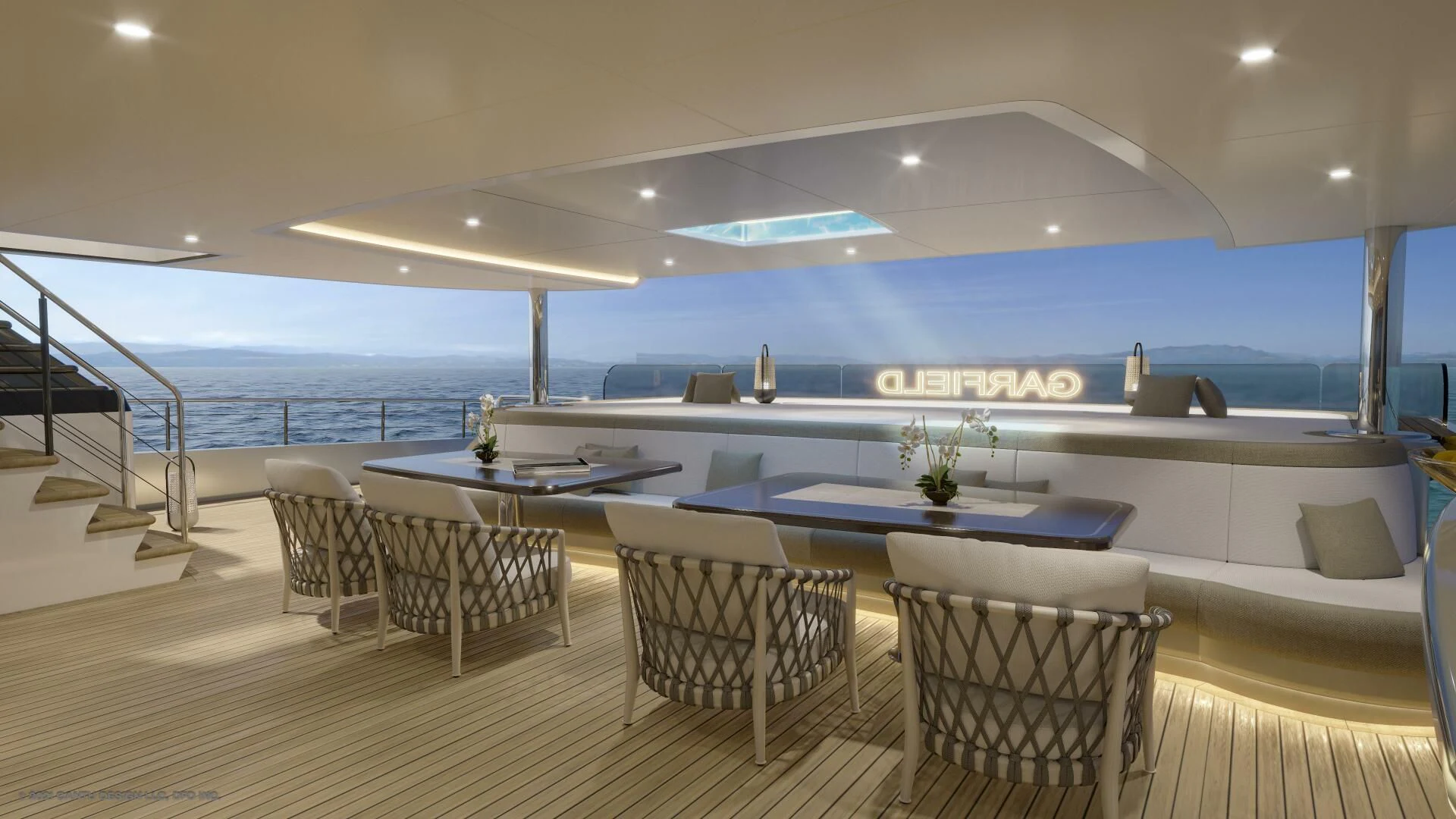 a large room with a table and chairs and a large pool aboard PROJECT GARFIELD Yacht for Sale