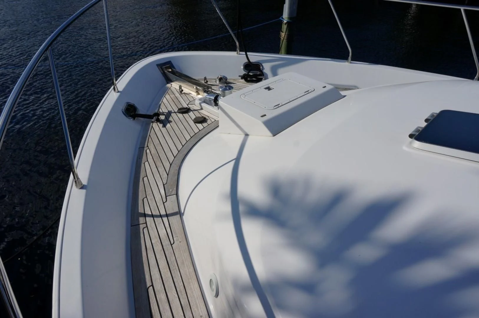 a white boat with a rope attached aboard SWEET LADY Yacht for Sale