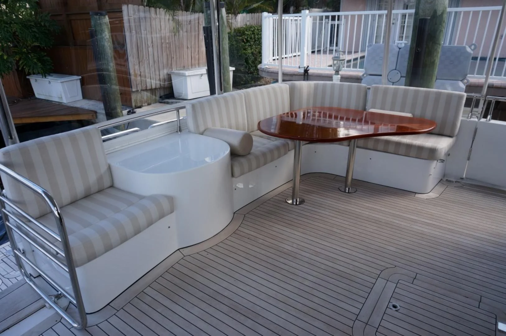 a room with a table and chairs aboard SWEET LADY Yacht for Sale