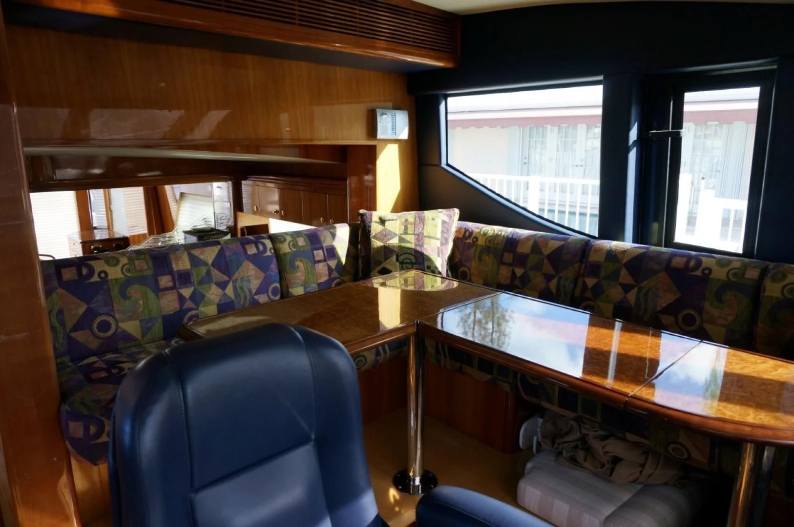 a living room with a couch and a table aboard SWEET LADY Yacht for Sale