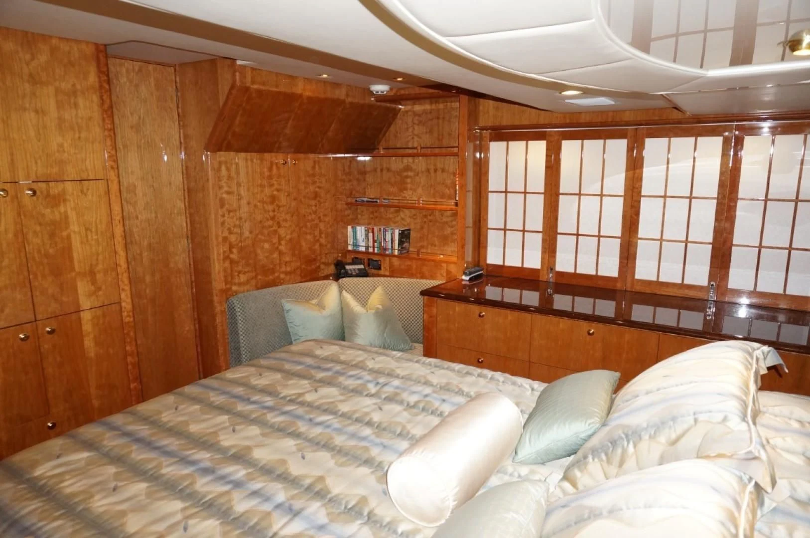 a bed with white sheets aboard SWEET LADY Yacht for Sale