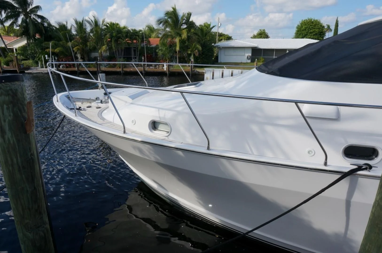 a white boat in a body of water aboard SWEET LADY Yacht for Sale