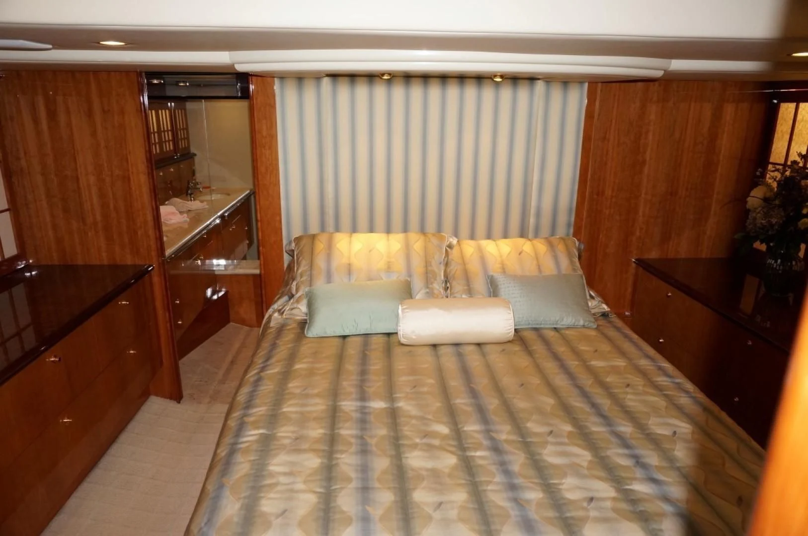 a bed in a room aboard SWEET LADY Yacht for Sale