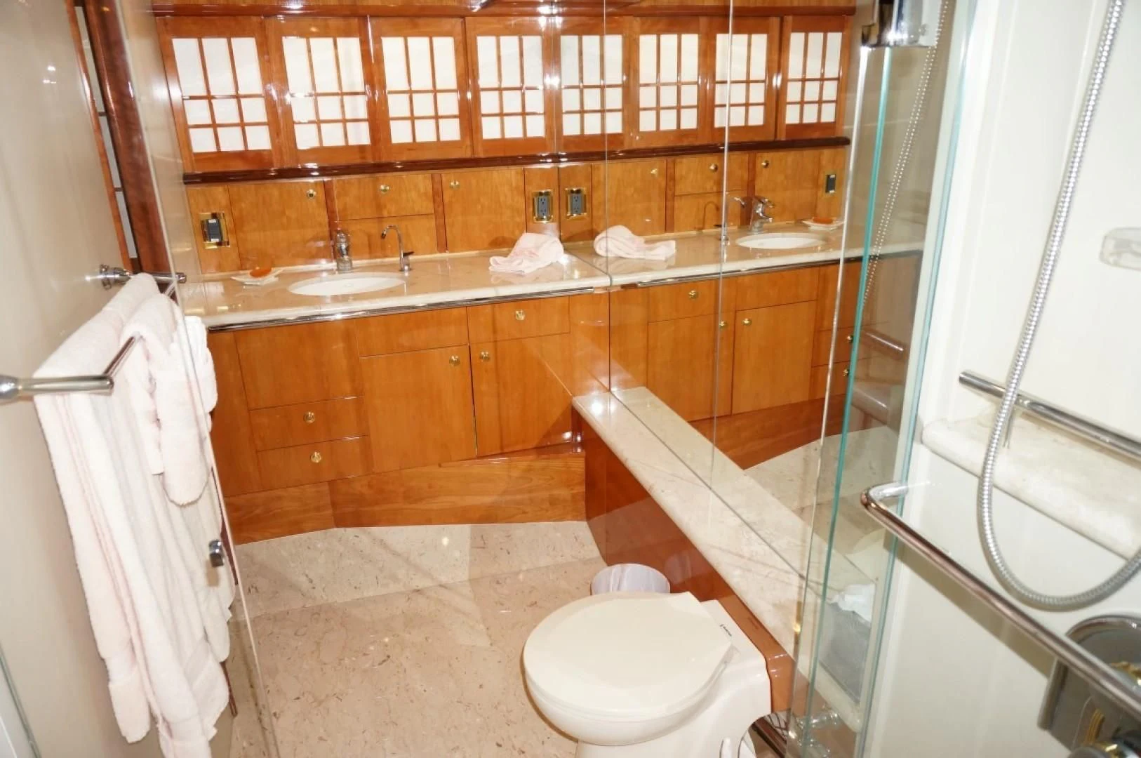 a bathroom with a glass shower aboard SWEET LADY Yacht for Sale