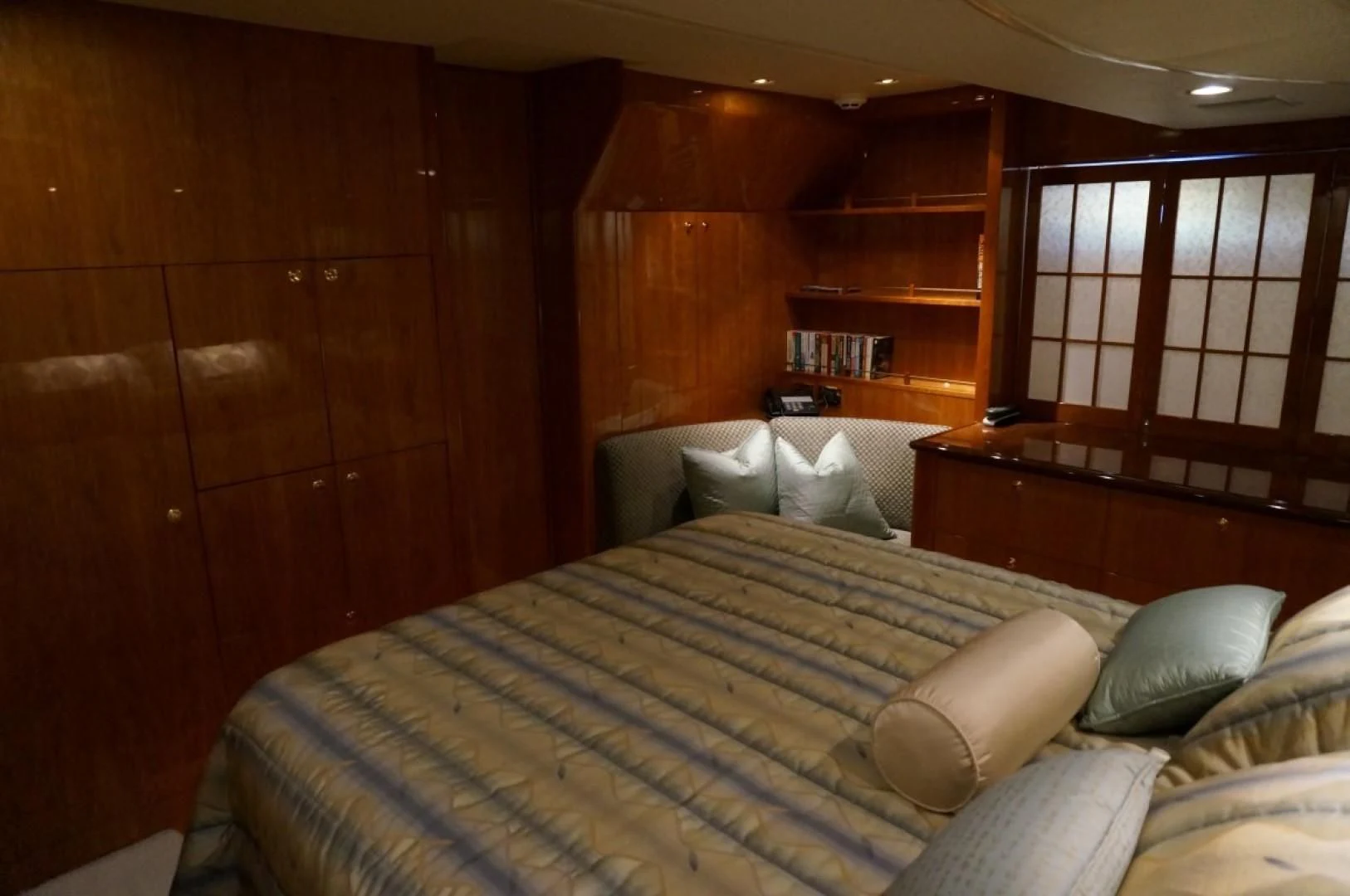 a bed in a room aboard SWEET LADY Yacht for Sale