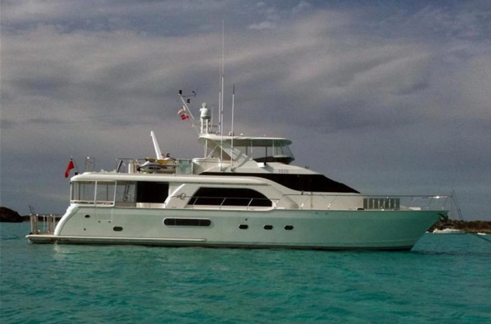 a white boat in the water aboard SWEET LADY Yacht for Sale