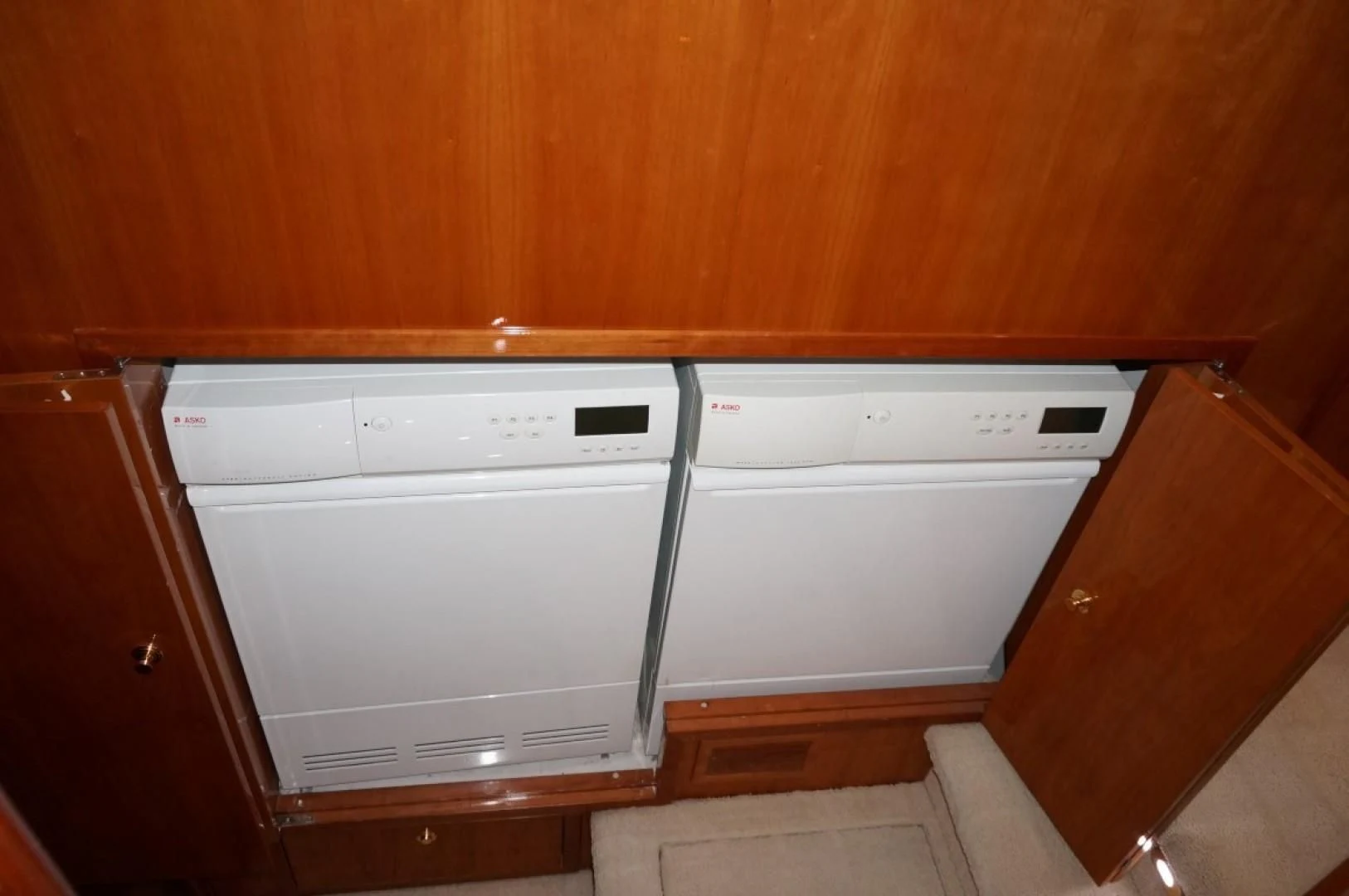a couple of white cabinets aboard SWEET LADY Yacht for Sale