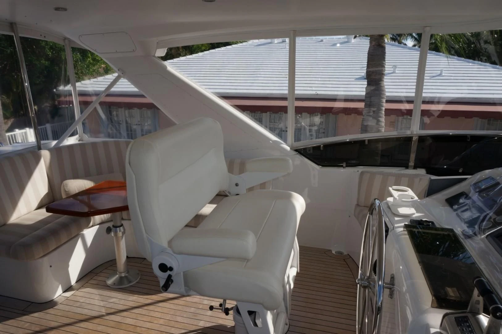 a white chair on a deck aboard SWEET LADY Yacht for Sale