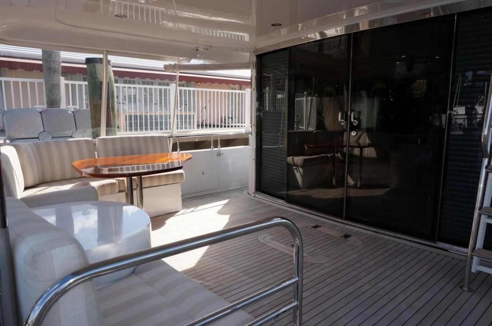a room with a table and chairs aboard SWEET LADY Yacht for Sale