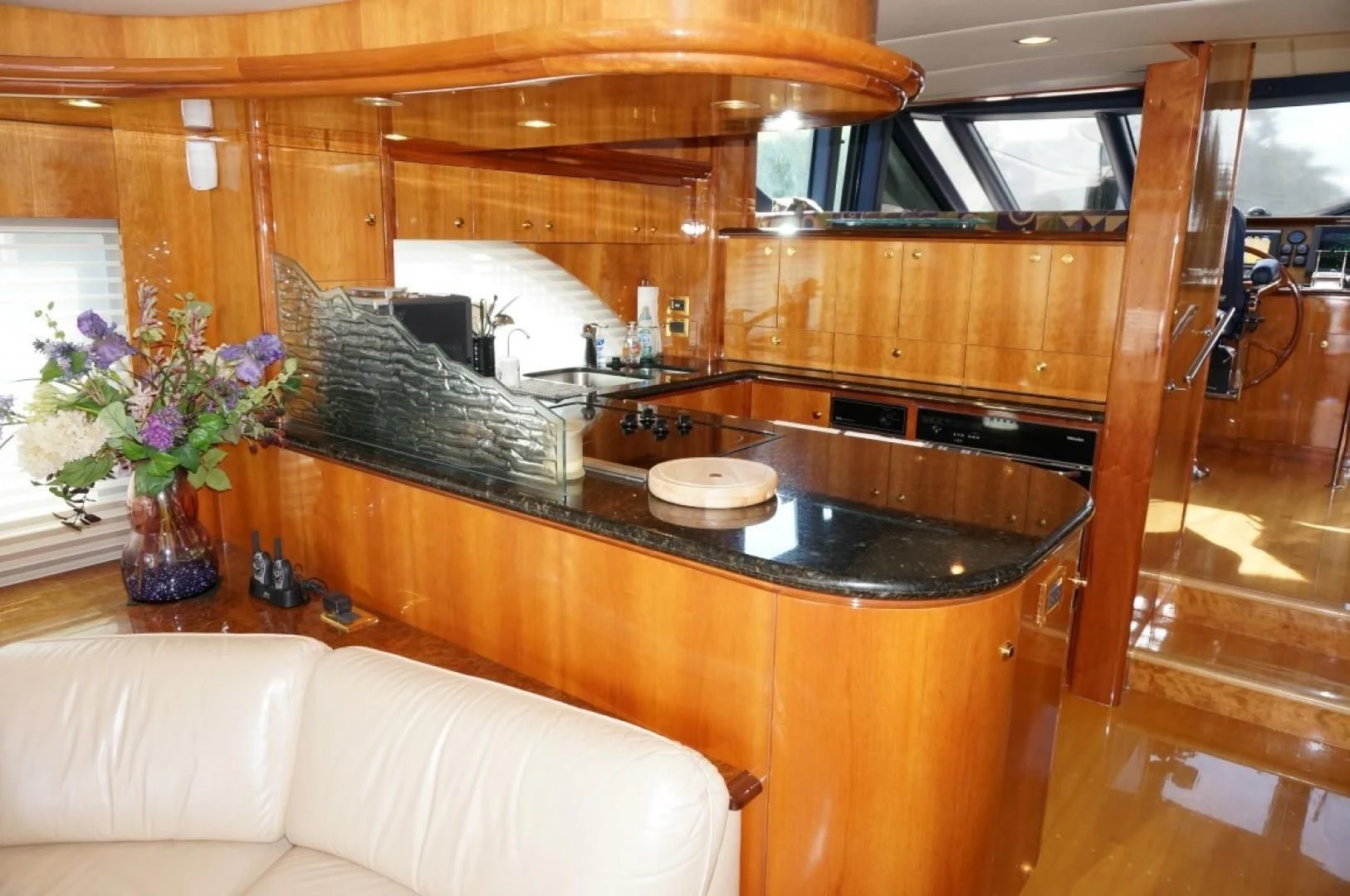 a kitchen with a large island aboard SWEET LADY Yacht for Sale
