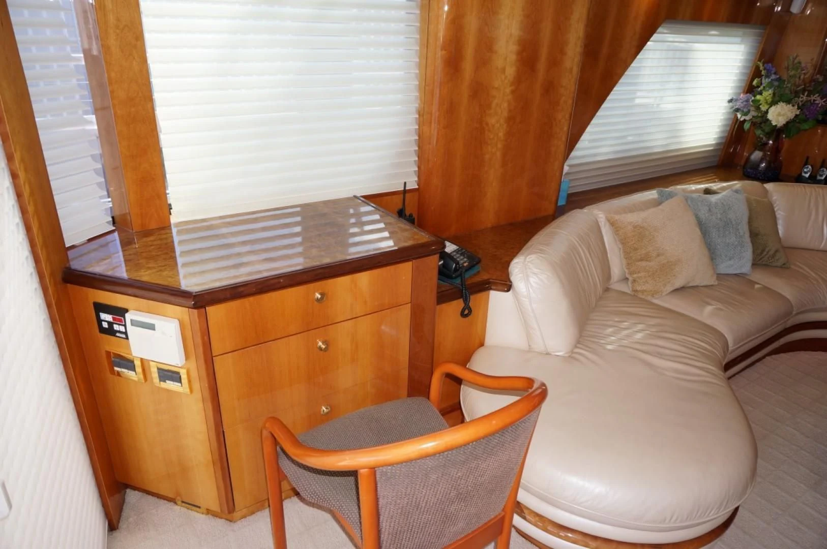 a living room with a couch and a table aboard SWEET LADY Yacht for Sale
