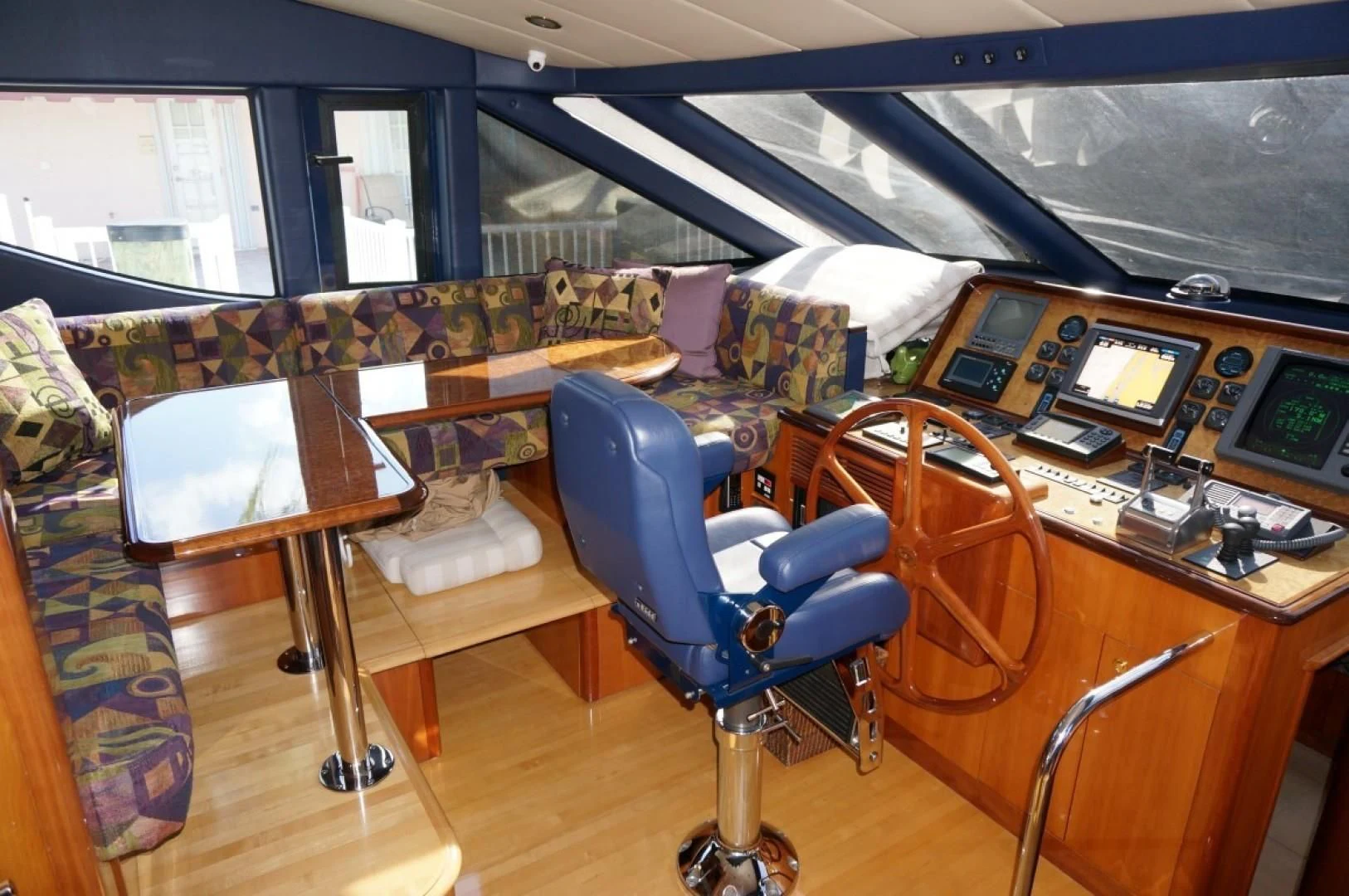 a room with a desk and chairs aboard SWEET LADY Yacht for Sale