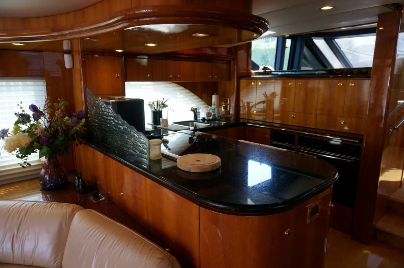a kitchen with a large island aboard SWEET LADY Yacht for Sale
