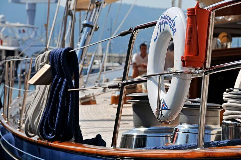 a pair of white shoes on a blue boat aboard ALEJANDRA Yacht for Sale