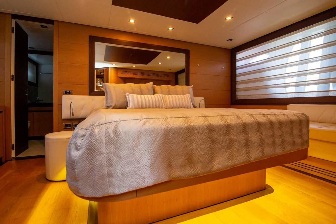 a large bed in a room aboard UPTOWN GIRL Yacht for Sale