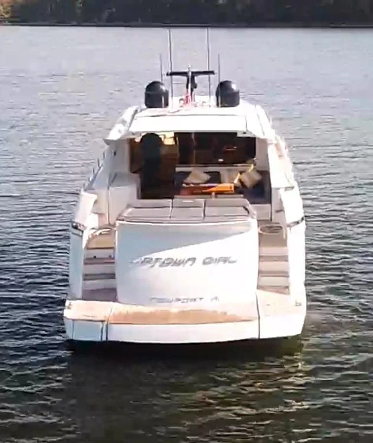 a boat on the water aboard UPTOWN GIRL Yacht for Sale