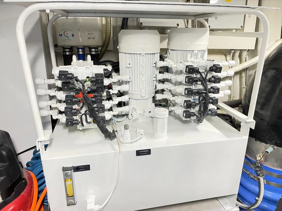 a white machine with a white cylinder aboard UPTOWN GIRL Yacht for Sale