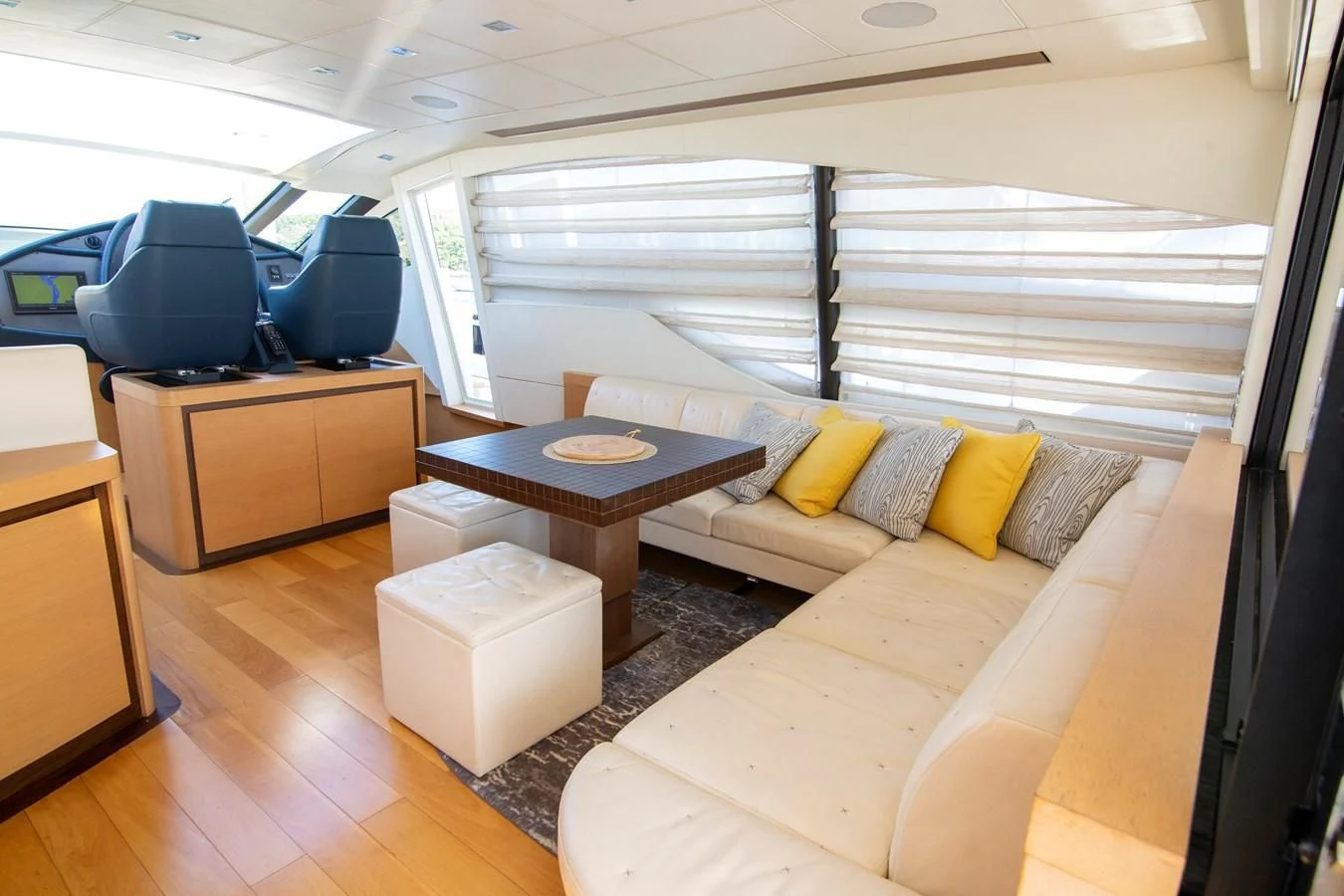 a room with a couch and a table aboard UPTOWN GIRL Yacht for Sale
