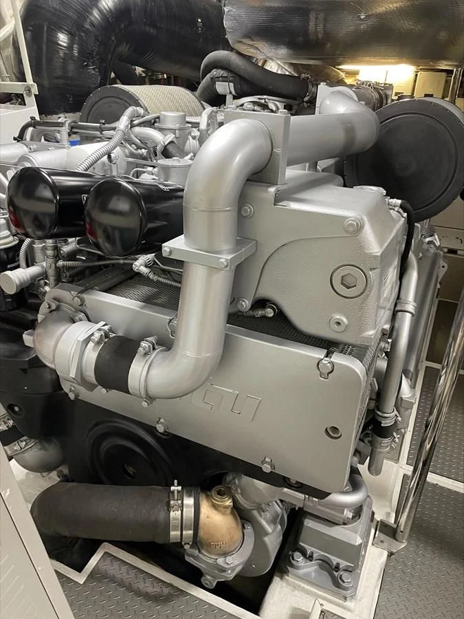 a close-up of a car engine aboard UPTOWN GIRL Yacht for Sale