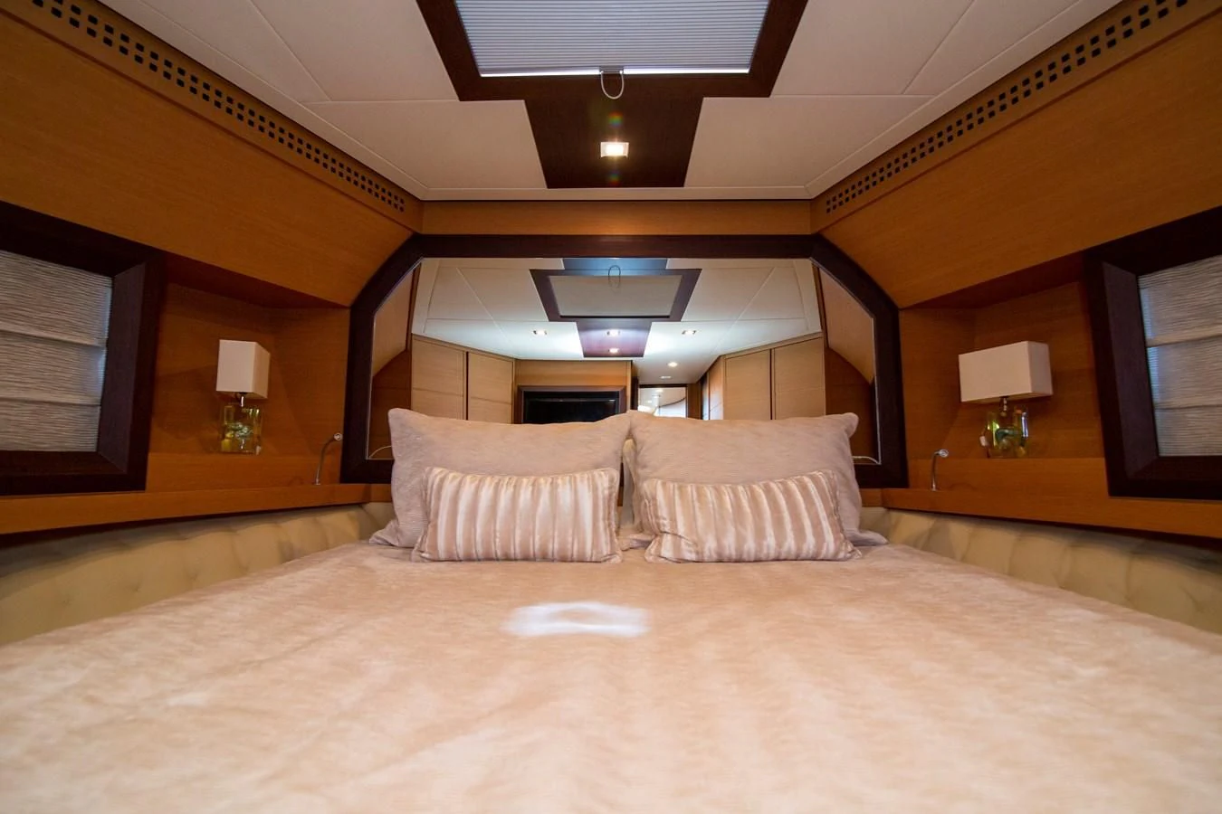 a large bed with pillows aboard UPTOWN GIRL Yacht for Sale