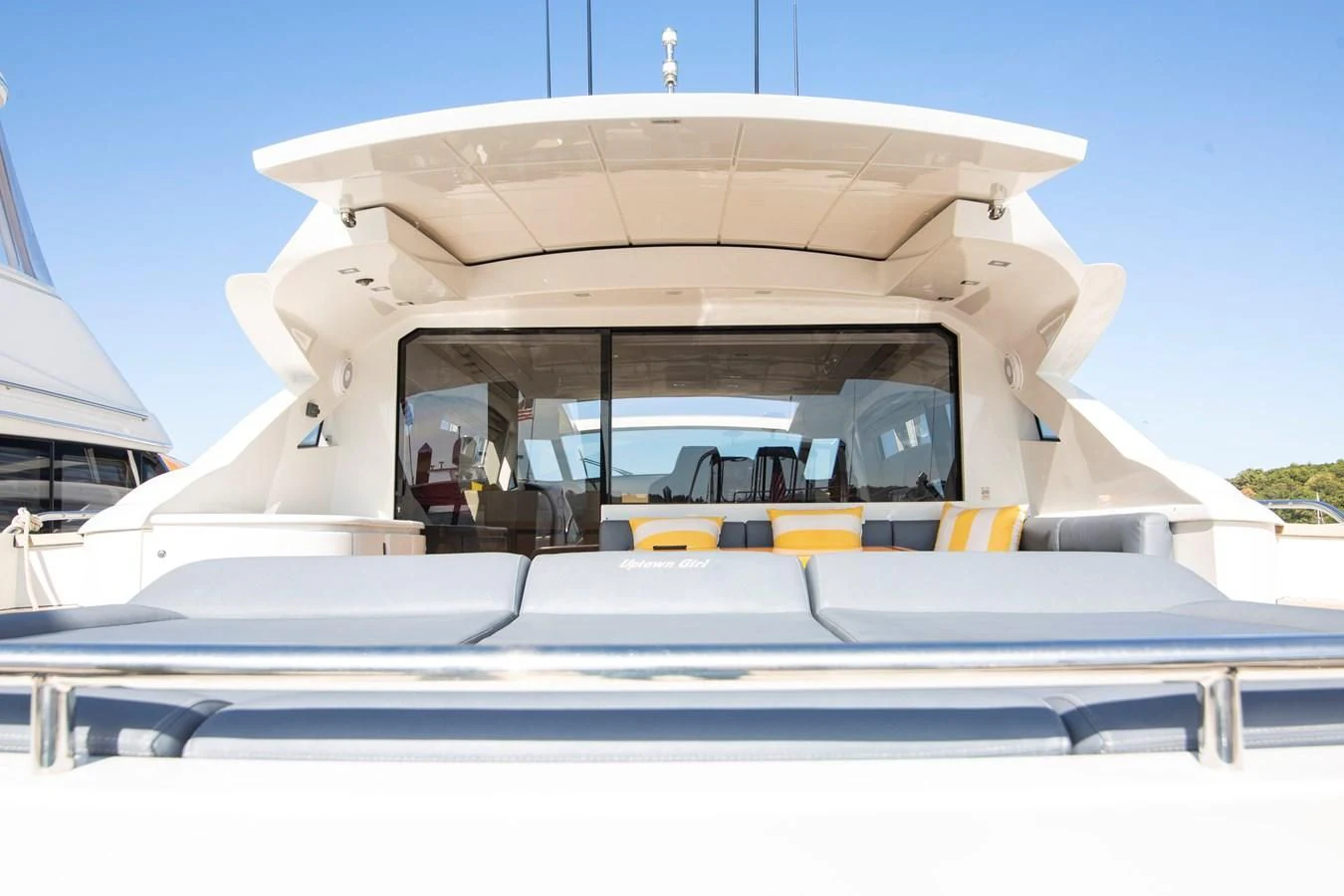 a boat with a canopy aboard UPTOWN GIRL Yacht for Sale