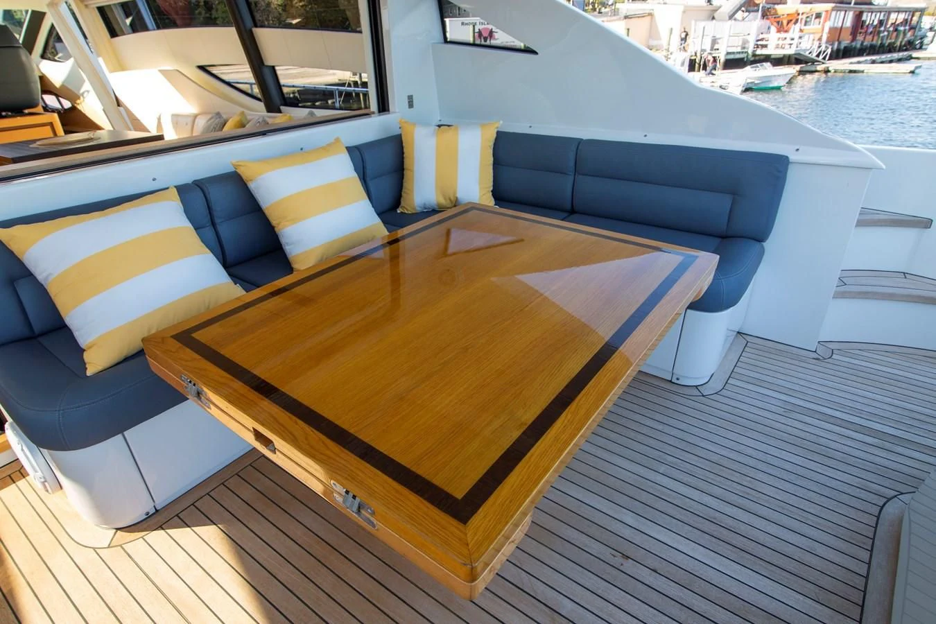 a table on a deck aboard UPTOWN GIRL Yacht for Sale