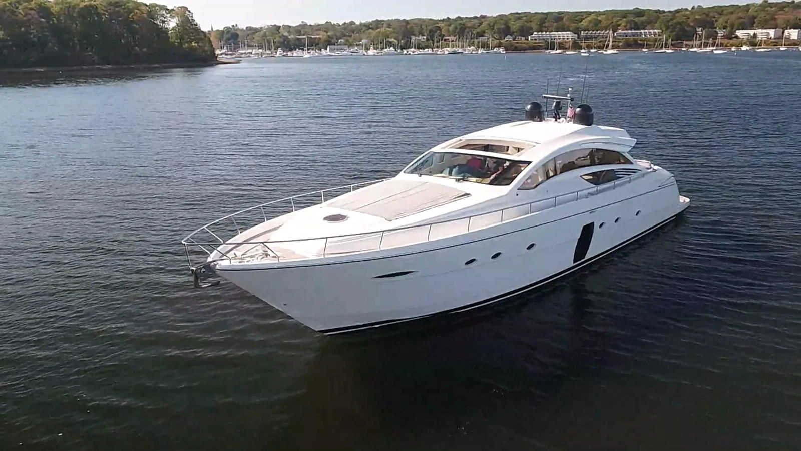 a white boat on the water aboard UPTOWN GIRL Yacht for Sale